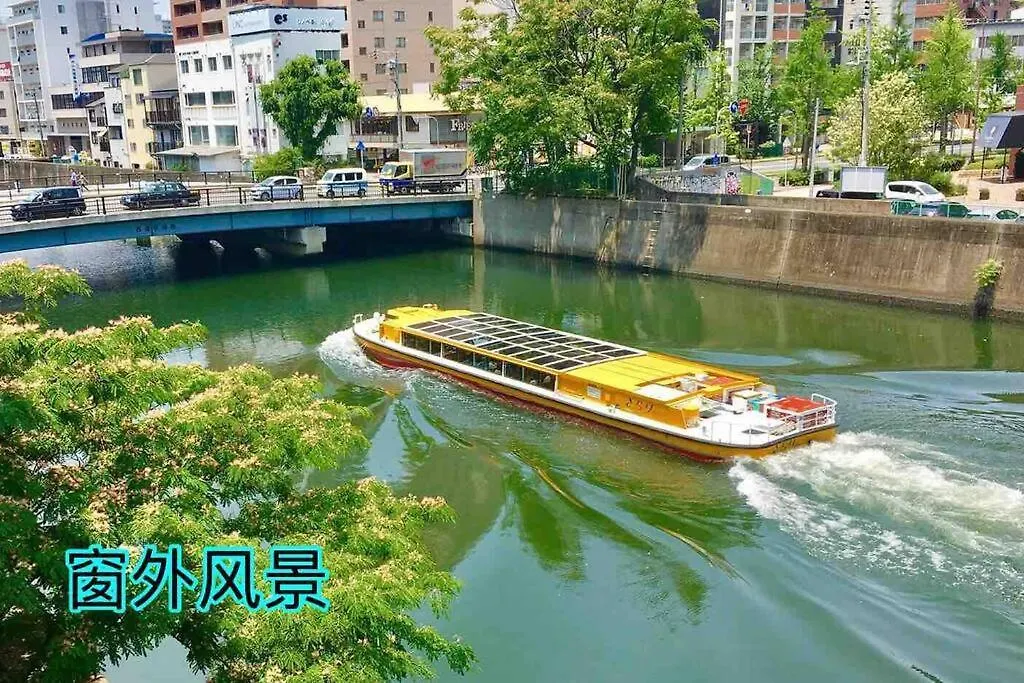 Apartament 大阪道頓堀リバーサイド。徒歩：難波駅4分、心斎橋7分、道頓堀4分、Orange Street 3分