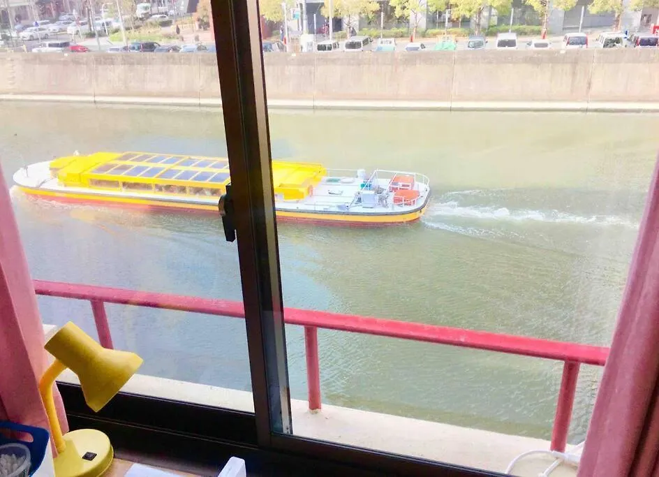 Apartament 大阪道頓堀リバーサイド。徒歩：難波駅4分、心斎橋7分、道頓堀4分、Orange Street 3分 Osaka